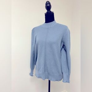 Sky blue sweater, women’s size L large, with ruffle detail